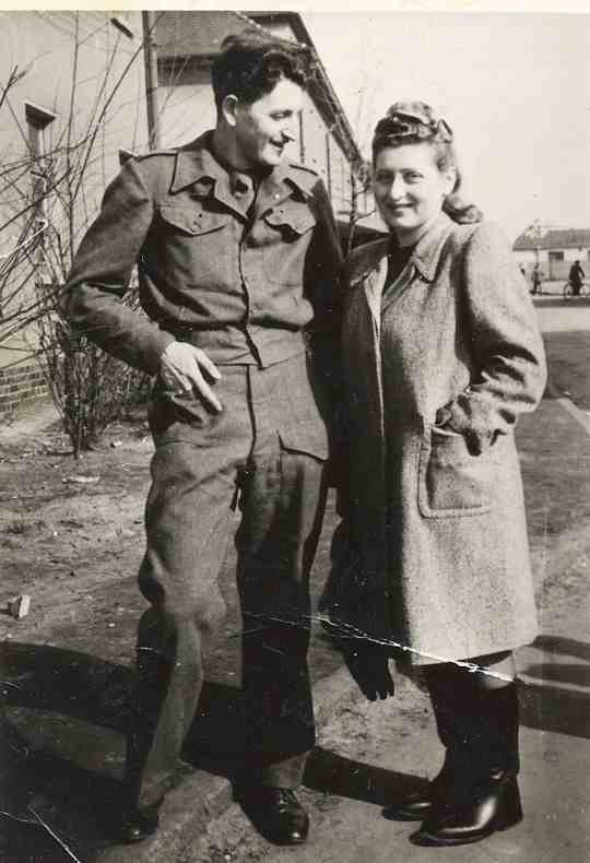 Maryla Neuman with a British soldier at Bergen-Belsen concentration camp after WWII